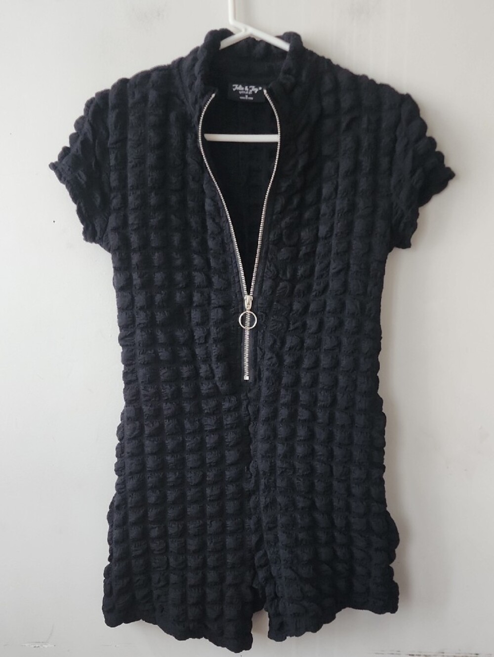 Black Textured Short-Sleeve Romper with Zip Front. New Without Tag - Picture 9 of 12